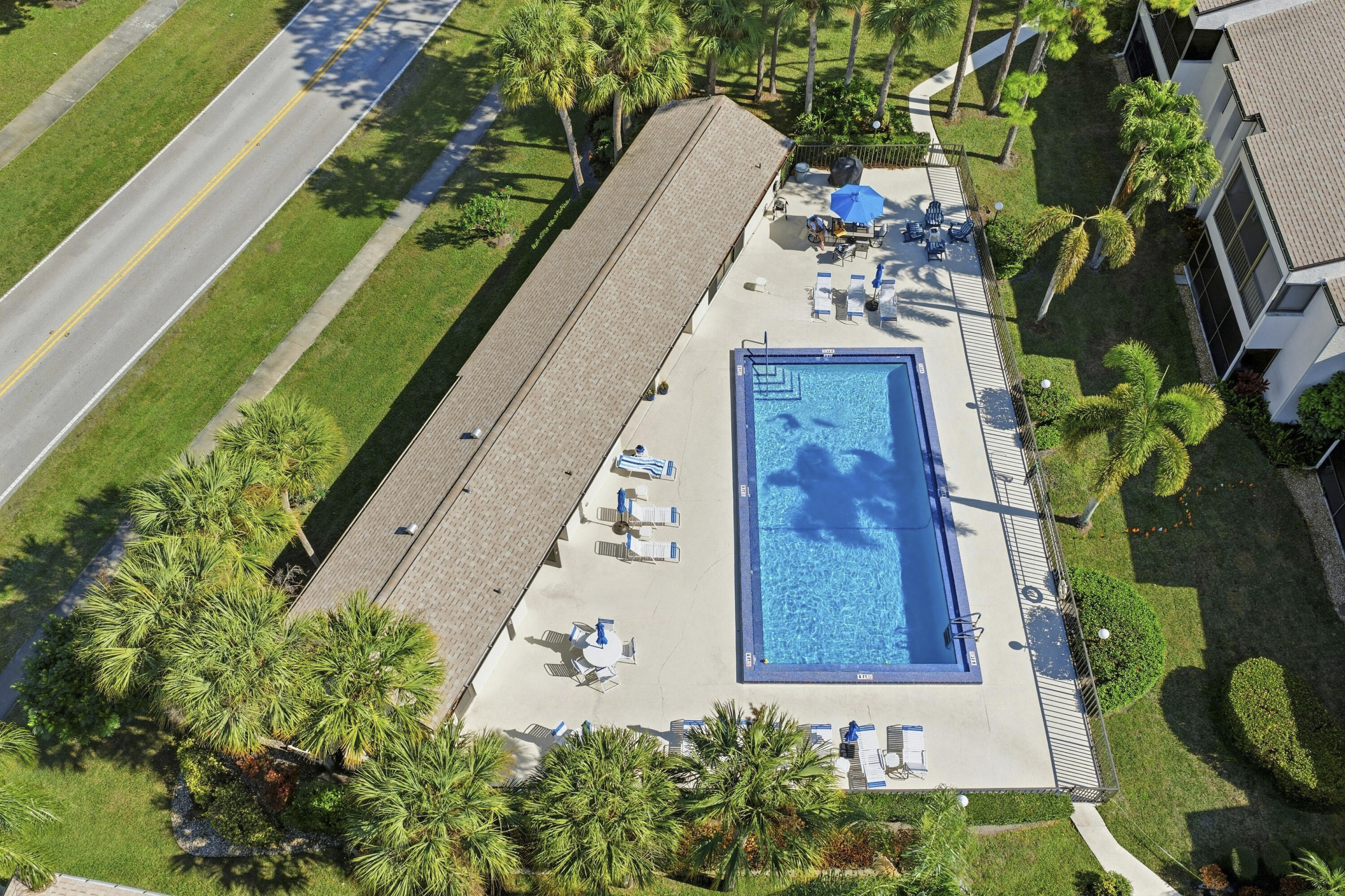 802 Wingfoot Drive, Unit B Jupiter, FL 33458 - Photo 23 of 30 DJI_20260124133329_0145_D_with_grass