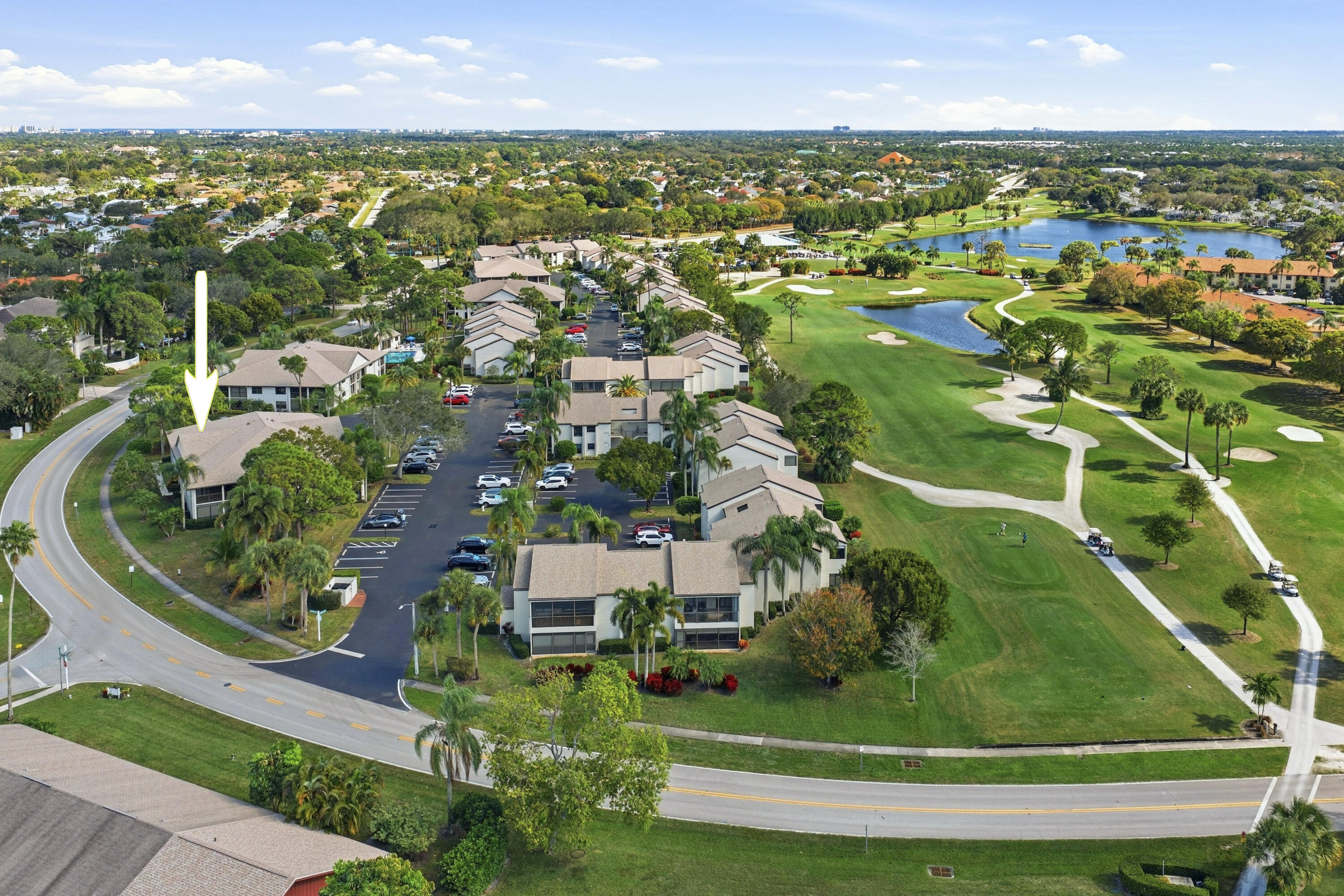 802 Wingfoot Drive, Unit B Jupiter, FL 33458 - Photo 28 of 30 DJI_20260124133829_0170_D_with_grass
