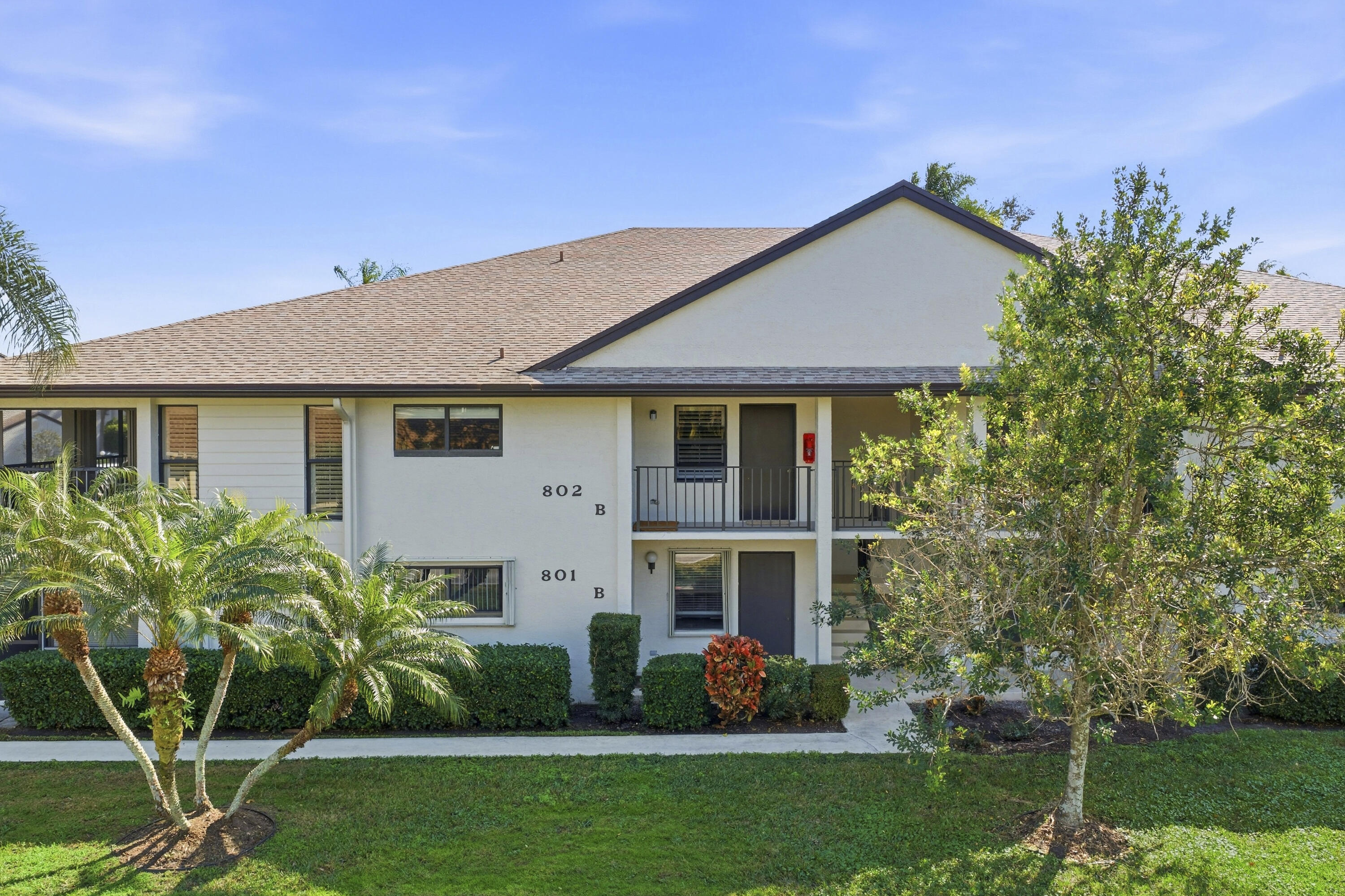 802 Wingfoot Drive, Unit B Jupiter, FL 33458 - Photo 30 of 30 DJI_20260124133258_0140_D_with_grass