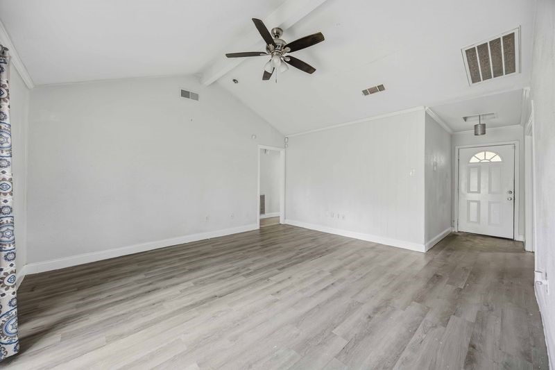 12659 Chiswick Road Houston, TX 77047 - Photo 4 of 21 wooden floor in an empty room