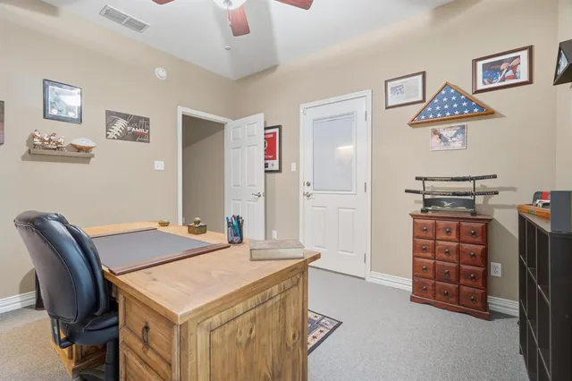 a view of kitchen and windows