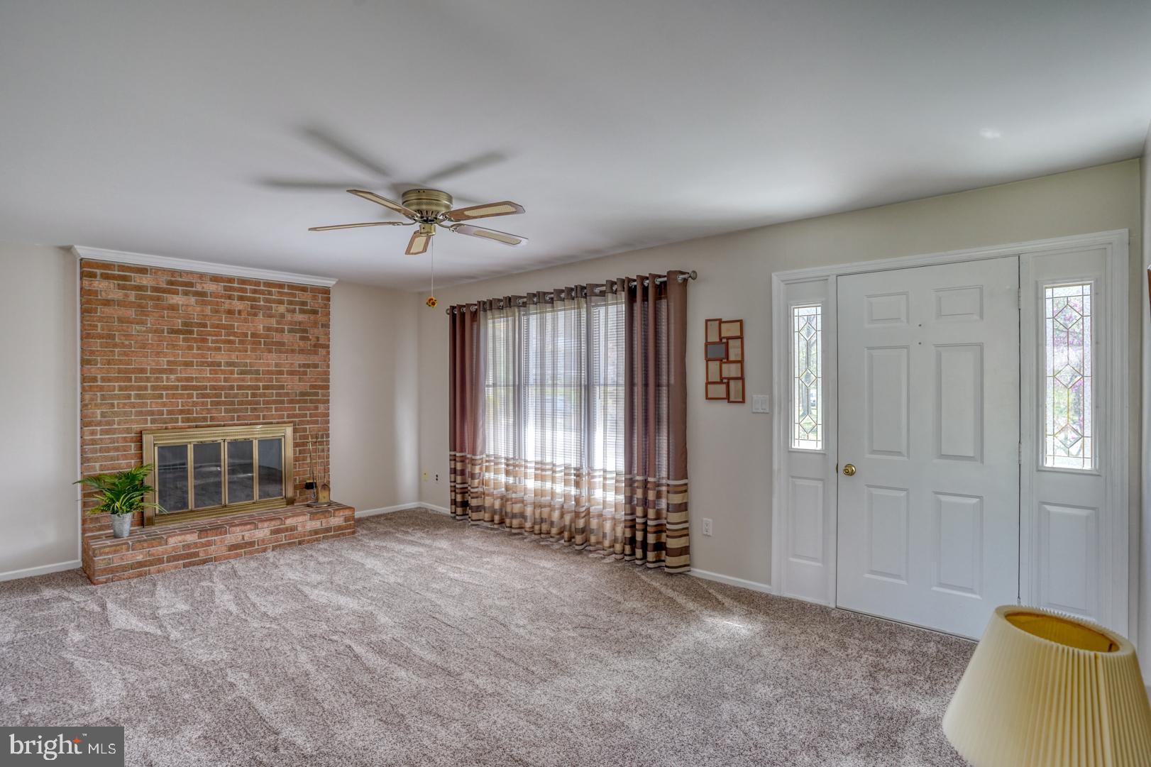 20 Tammie Drive Bear, DE 19701 - Photo 12 of 37 wooden floor and windows in an empty room