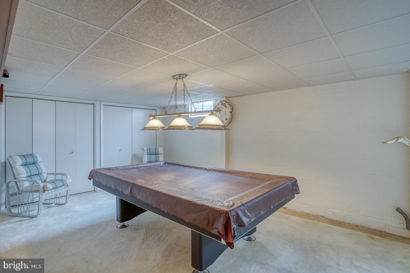 20 Tammie Drive Bear, DE 19701 - Photo 33 of 37 a room with pool table and chandelier
