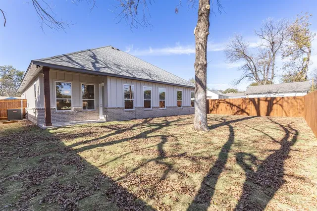 a view of a house with snow on the wall