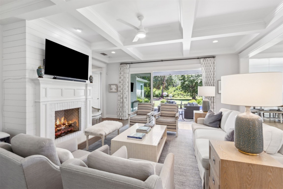 2930 Riverbend Walk Fernandina Beach, FL 32034 - Photo 2 of 60 a living room with furniture fireplace and a flat screen tv
