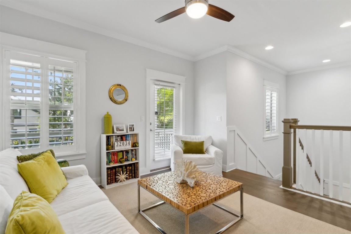 2930 Riverbend Walk Fernandina Beach, FL 32034 - Photo 38 of 60 a living room with furniture and a wooden floor