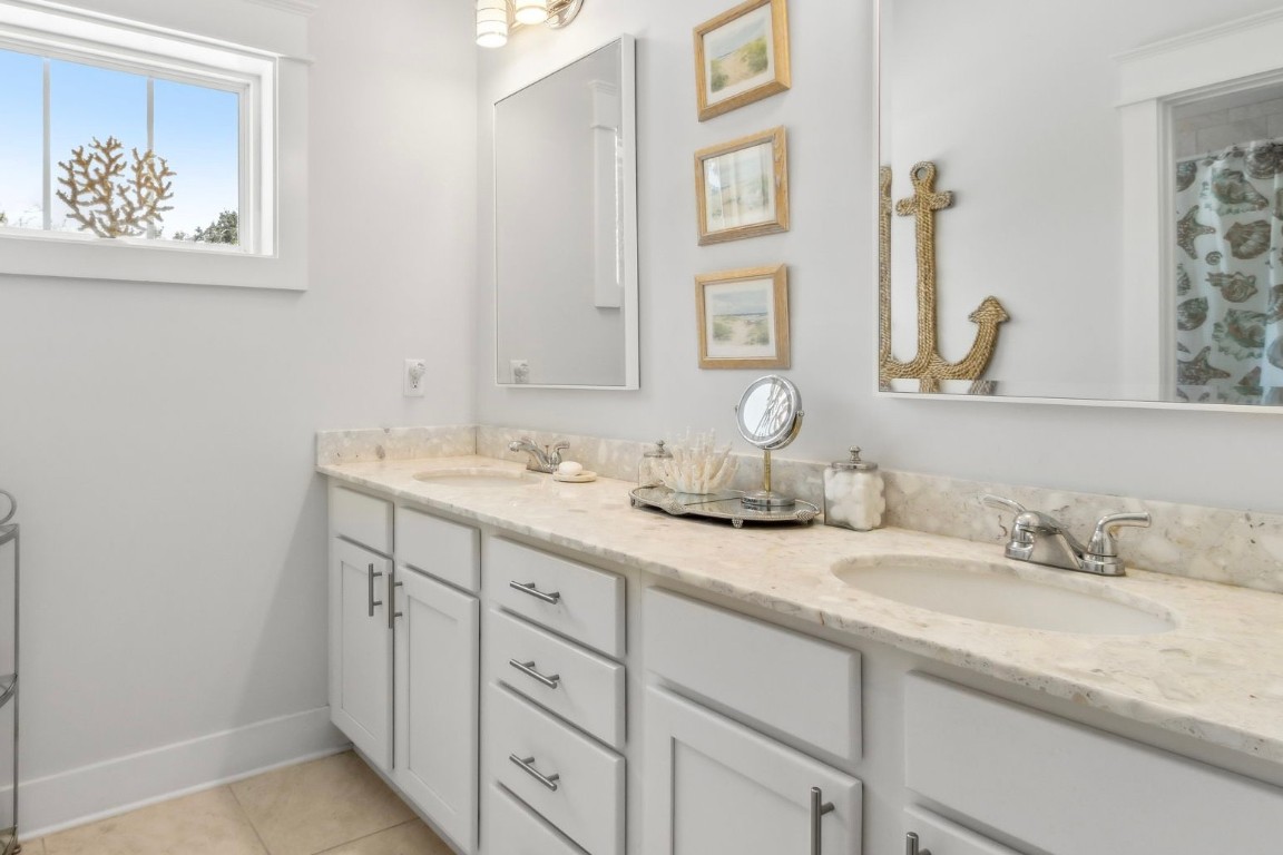 2930 Riverbend Walk Fernandina Beach, FL 32034 - Photo 43 of 60 a bathroom with double sink and a mirror