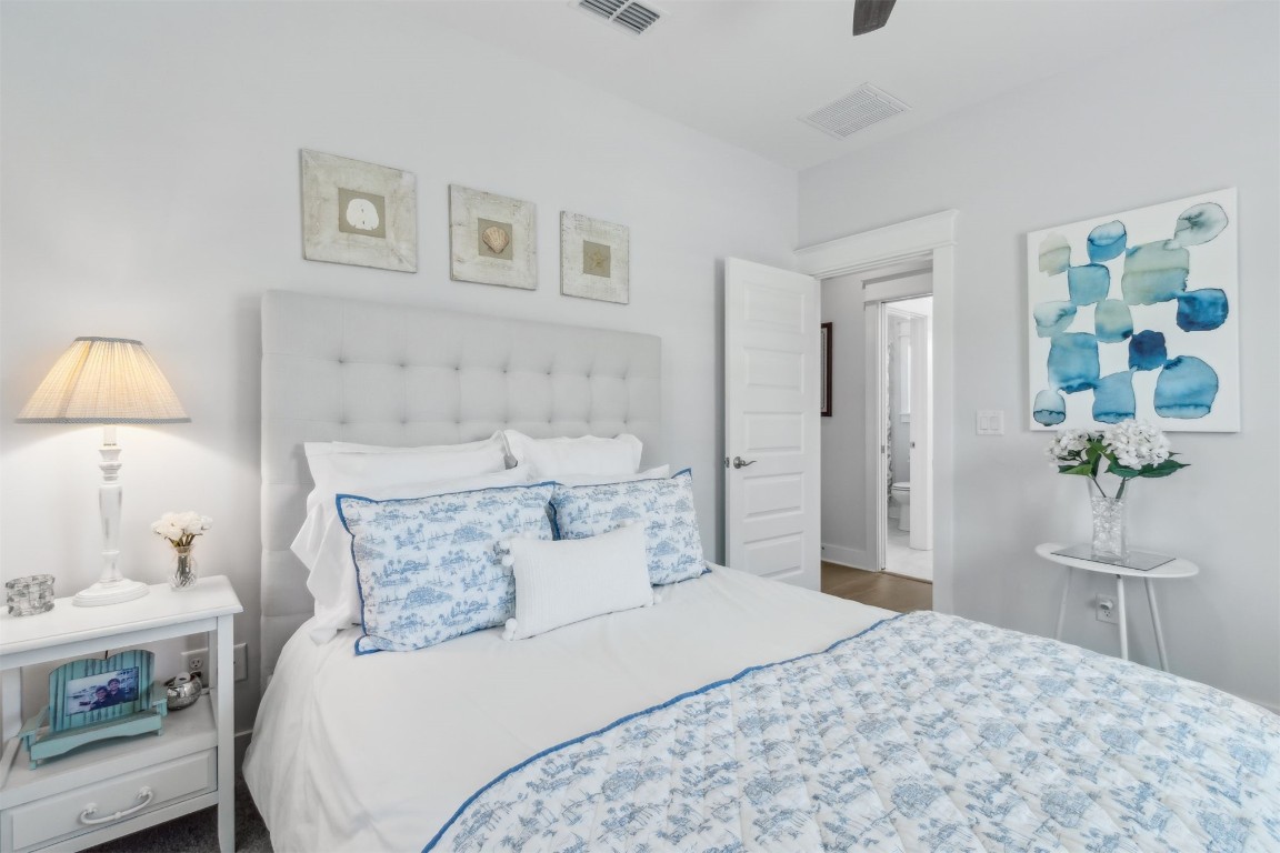 2930 Riverbend Walk Fernandina Beach, FL 32034 - Photo 47 of 60 a bedroom with a bed and a lamp