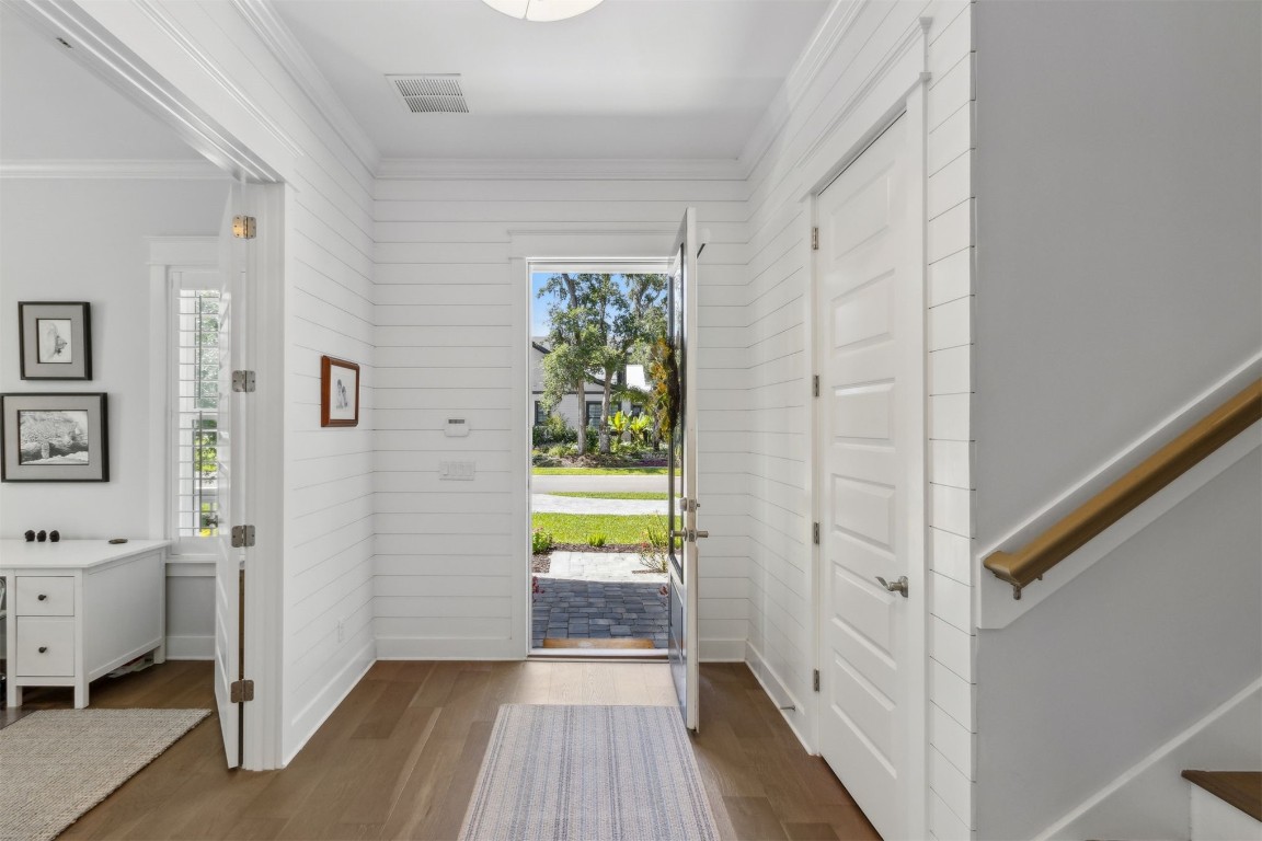 2930 Riverbend Walk Fernandina Beach, FL 32034 - Photo 60 of 60 a view of a hallway with bathroom and wooden floor