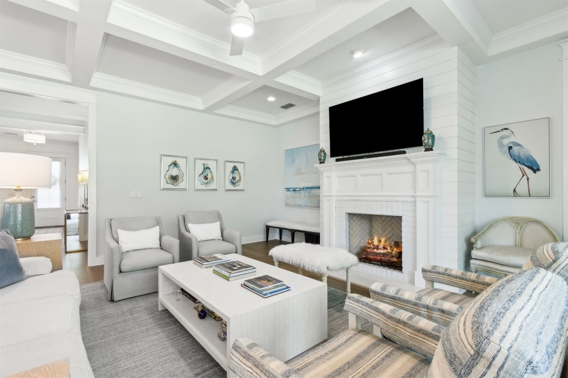 2930 Riverbend Walk Fernandina Beach, FL 32034 - Photo 6 of 60 a living room with fireplace furniture and a flat screen tv