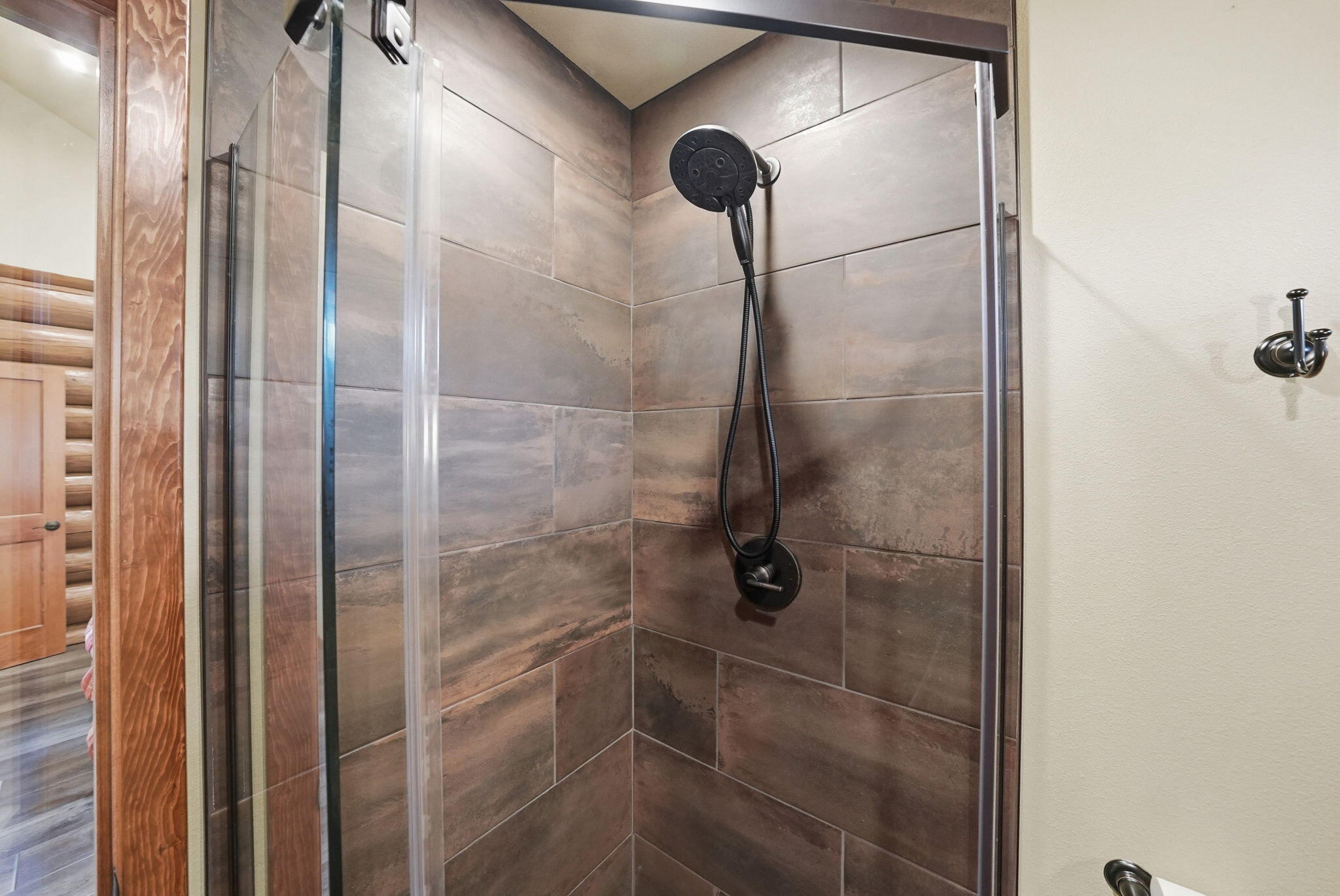 54270 Huntington Road La Pine, OR 97739 - Photo 19 of 68 a bathroom with a glass shower door