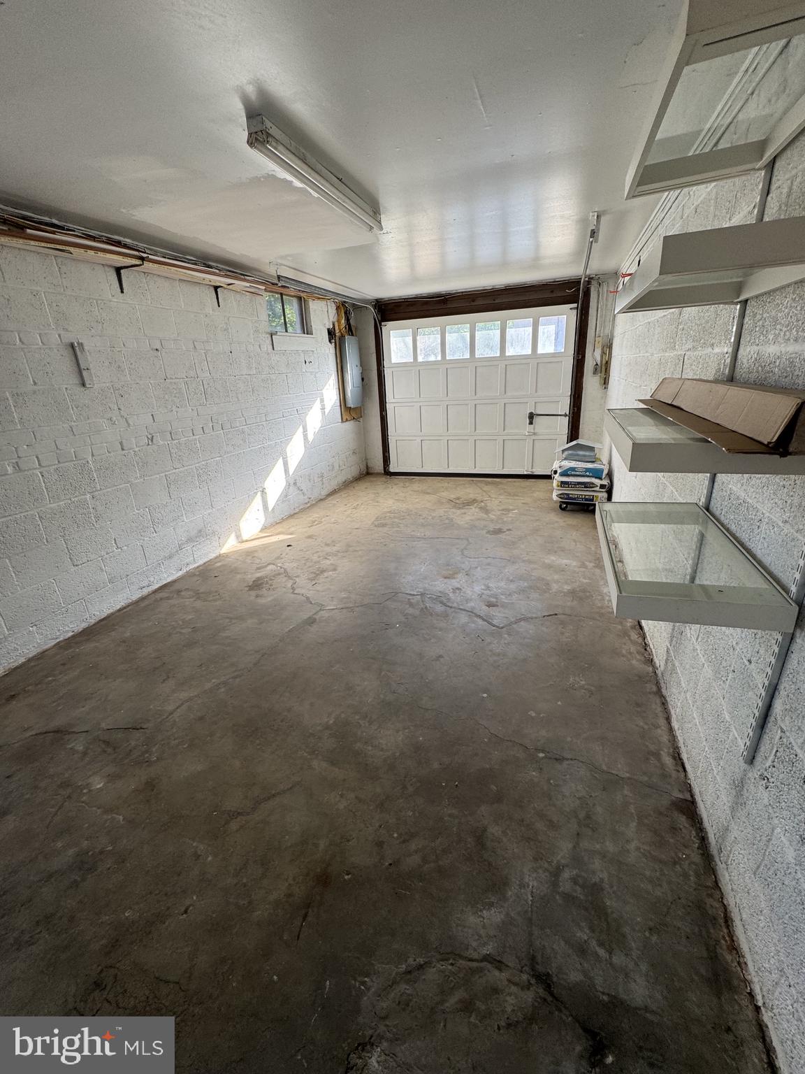 7410 Dickenson Street Springfield, VA 22150 - Photo 13 of 14 Spacious garage with natural light.