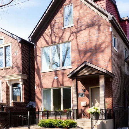a view of a brick wall with a window
