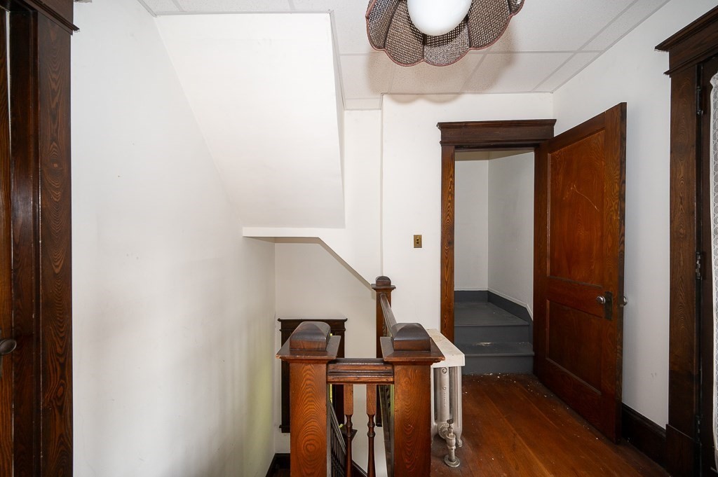 12 Prescott Street Springfield, MA 01108 - Photo 17 of 39 a view of entryway and hall with wooden floor