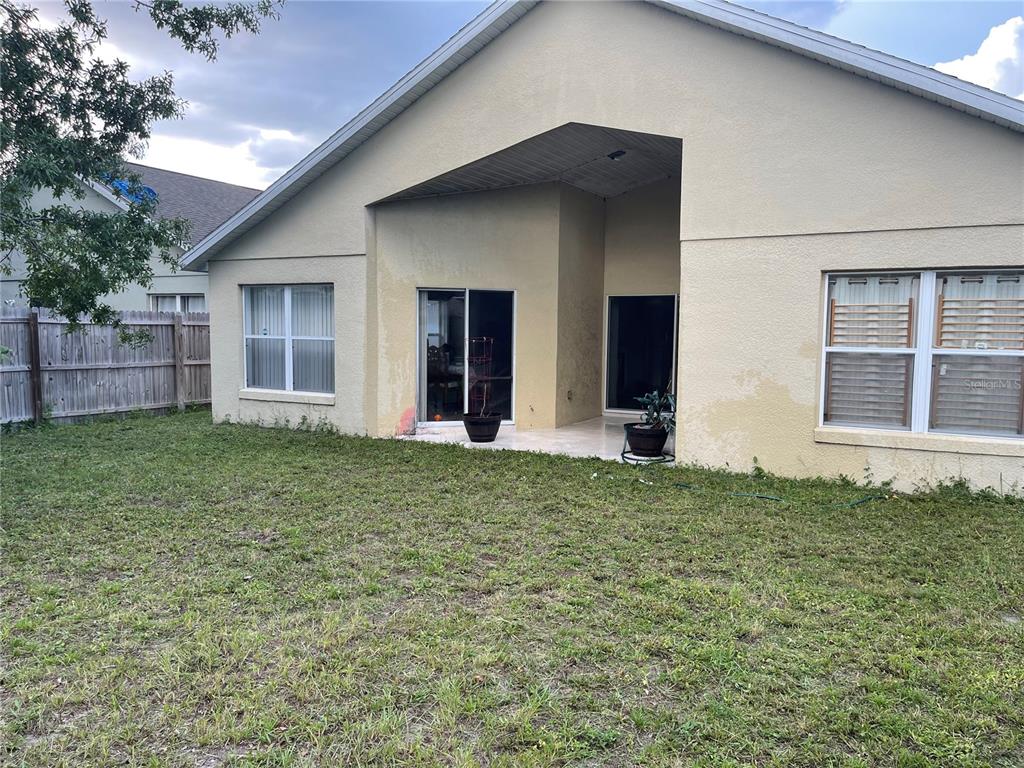 11156 Rouse Run Circle Orlando, FL 32817 - Photo 14 of 15 a house view with a garden space