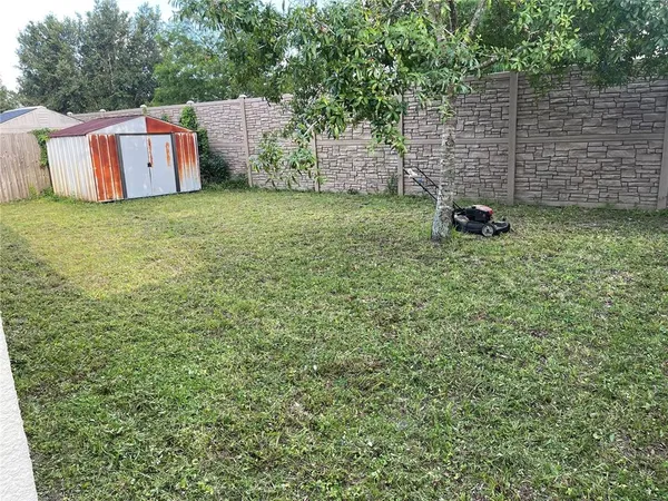 a view of a wall with an outdoor space