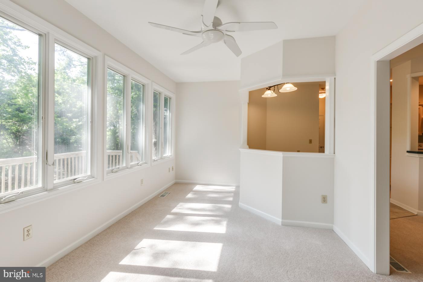 1136 Riverside Drive Salisbury, MD 21801 - Photo 14 of 27 Sun Room Open to Casual Dining Area & Family Room