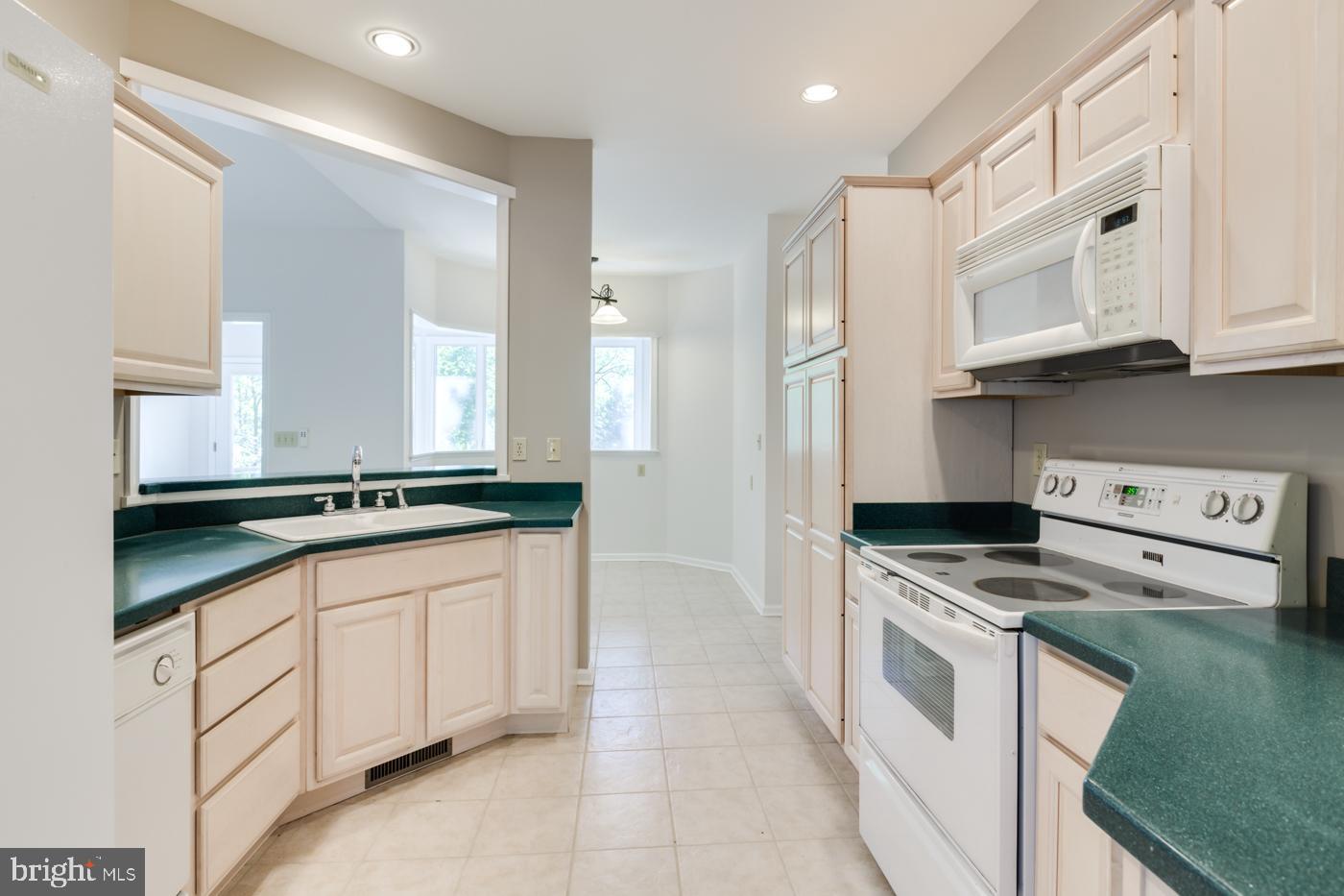 1136 Riverside Drive Salisbury, MD 21801 - Photo 10 of 27 Tile Flooring and Corian Counter Tops
