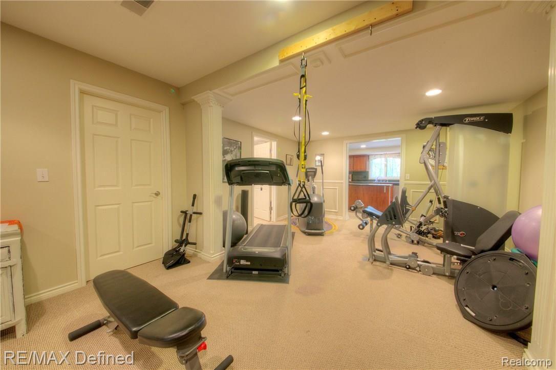 3505 Moceri Court Rochester, MI 48306 - Photo 57 of 64 view from the home gym into the lower kitchen