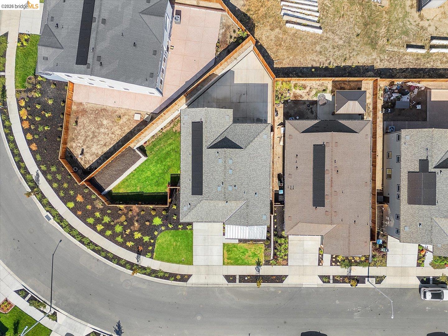 5601 Ridgepoint Way Antioch, CA 94531 - Photo 58 of 59 Aerial view showcasing a residential property with a partial green lawn