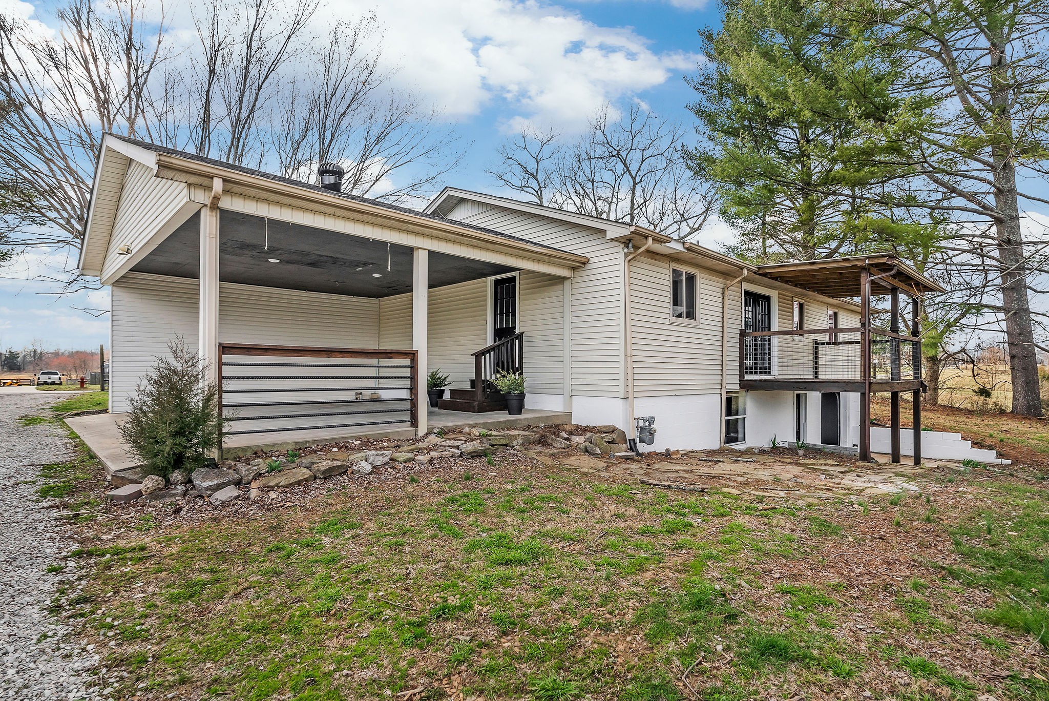 7159 Ditty Road Cookeville, TN 38506 - Photo 34 of 49 a house with trees in front of it