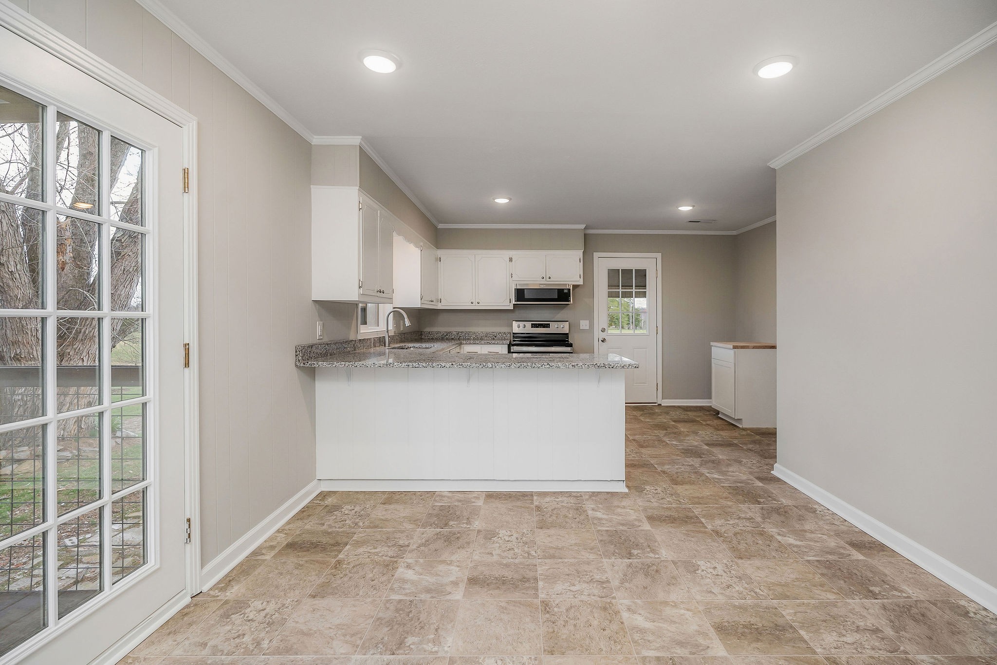 7159 Ditty Road Cookeville, TN 38506 - Photo 5 of 49 a view of kitchen with refrigerator sink and microwave