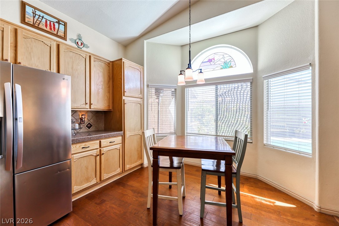 2001 Appaloosa Road Henderson, NV 89002 - Photo 24 of 44 This cozy kitchen features a practical layout with warm wooden cabinetry and abundant natural light.
