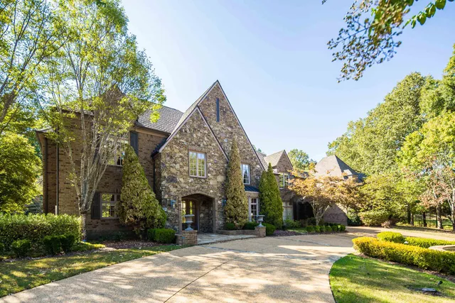 a view of a building with a garden