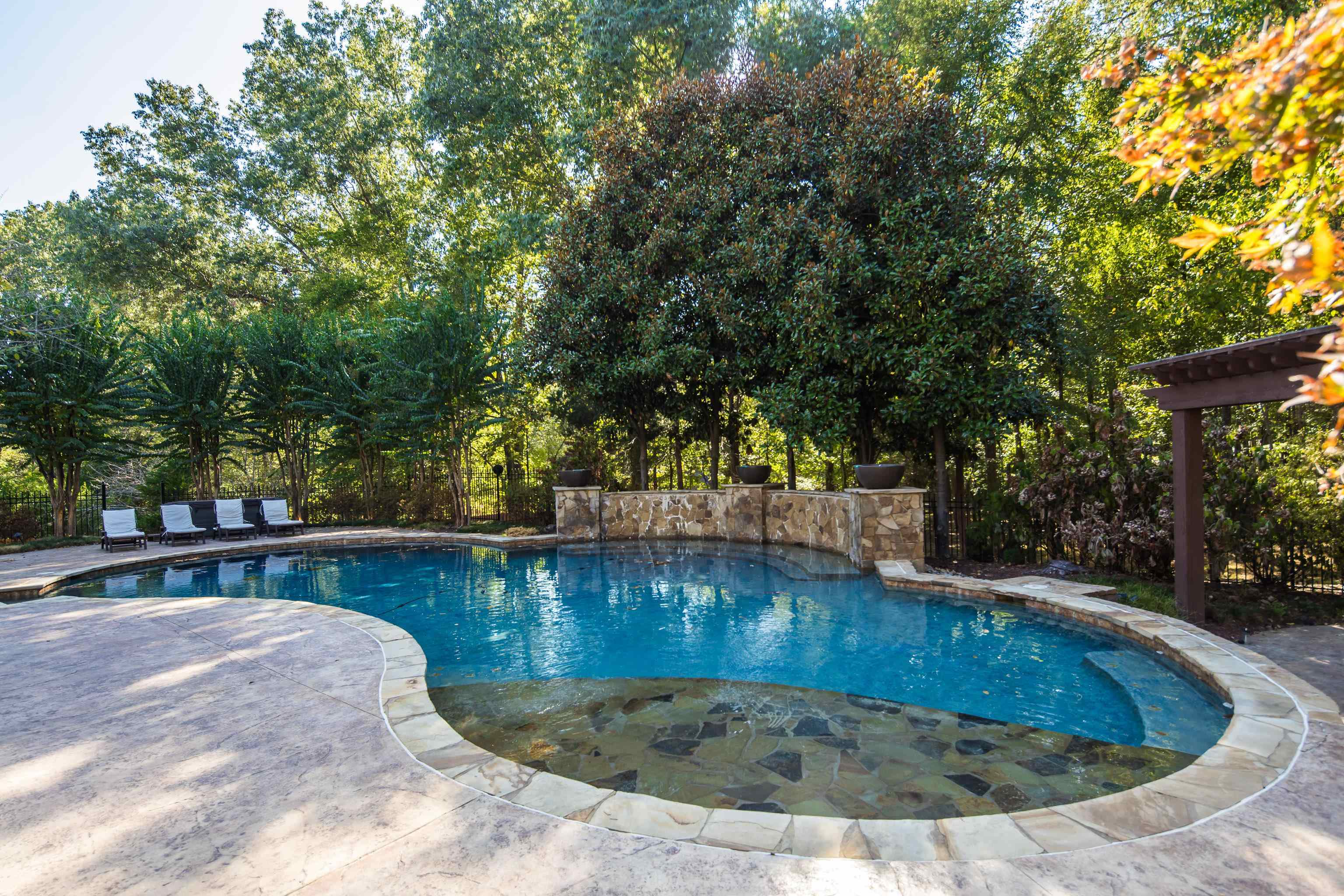 425 Buckland Cove Eads, TN 38028 - Photo 24 of 29 a view of a swimming pool with a patio