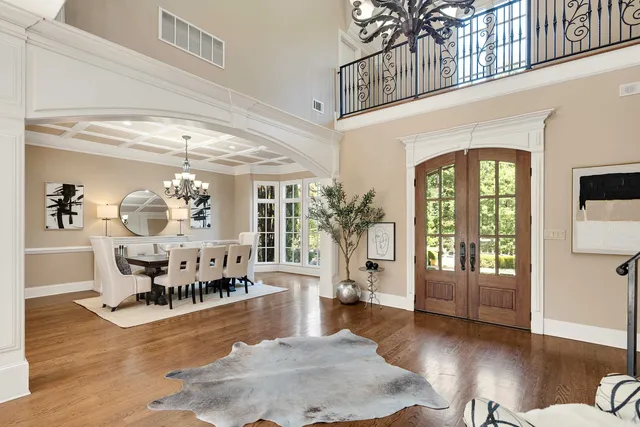 a view of a livingroom with furniture window and wooden floor