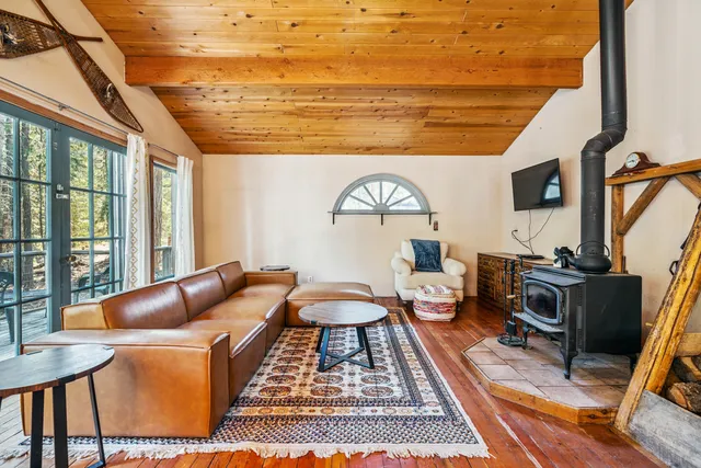 a kitchen with a sink a counter and a window