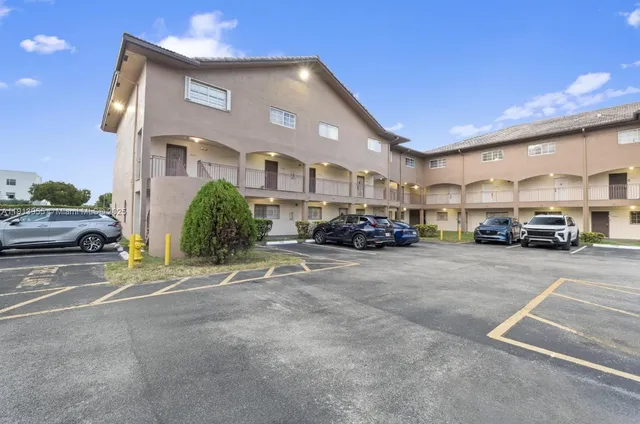 a car parked in front of a building