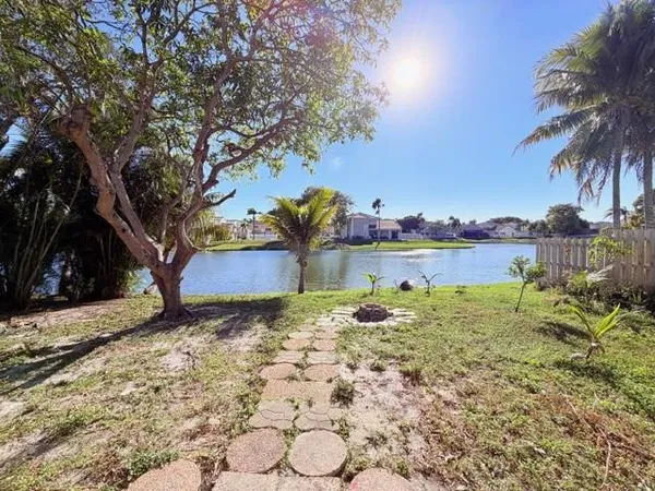 a backyard of a house with lots of green space