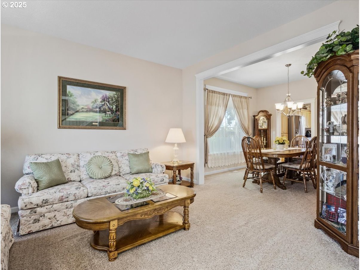 863 June Drive Molalla, OR 97038 - Photo 11 of 36 a living room with furniture and a table