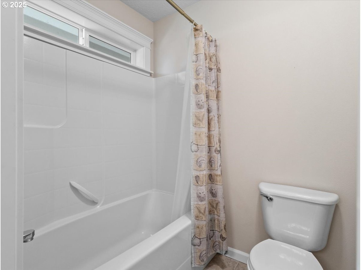 863 June Drive Molalla, OR 97038 - Photo 26 of 36 a bathroom with a toilet and a shower