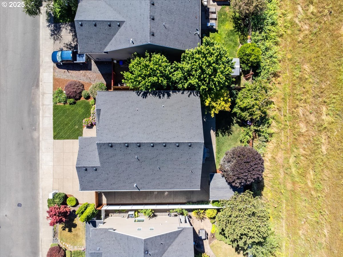 863 June Drive Molalla, OR 97038 - Photo 36 of 36 an aerial view of a house with a yard and garden