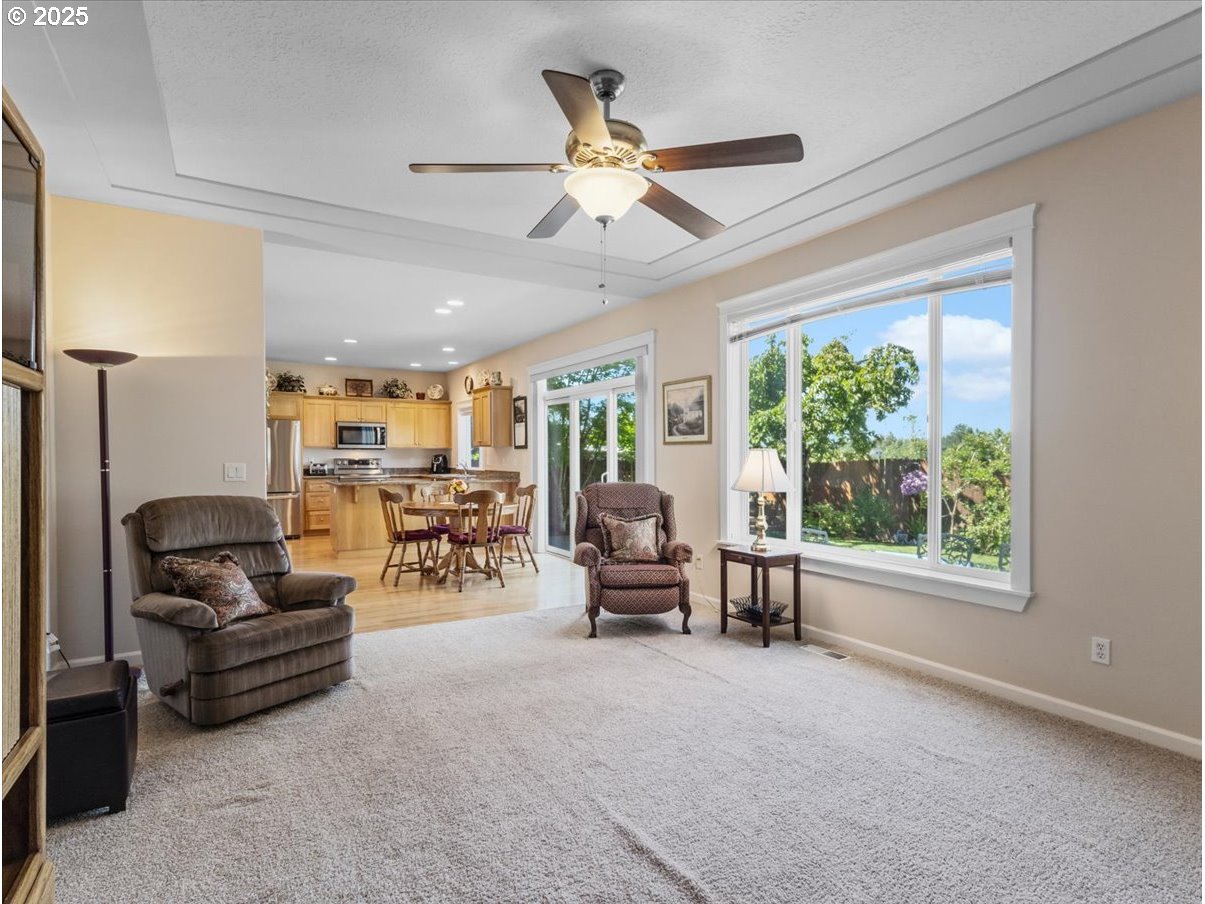 863 June Drive Molalla, OR 97038 - Photo 8 of 36 a living room with furniture and a large window