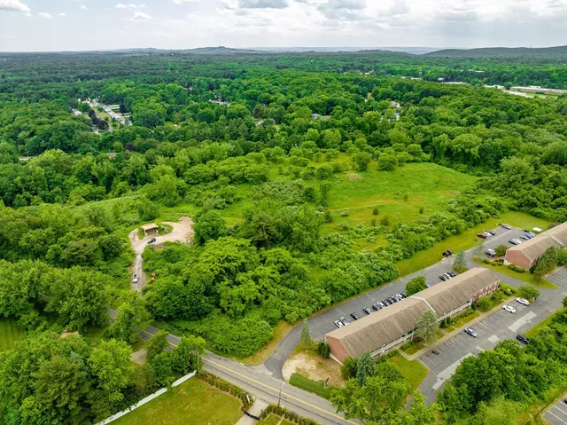a view of a yard with a garden
