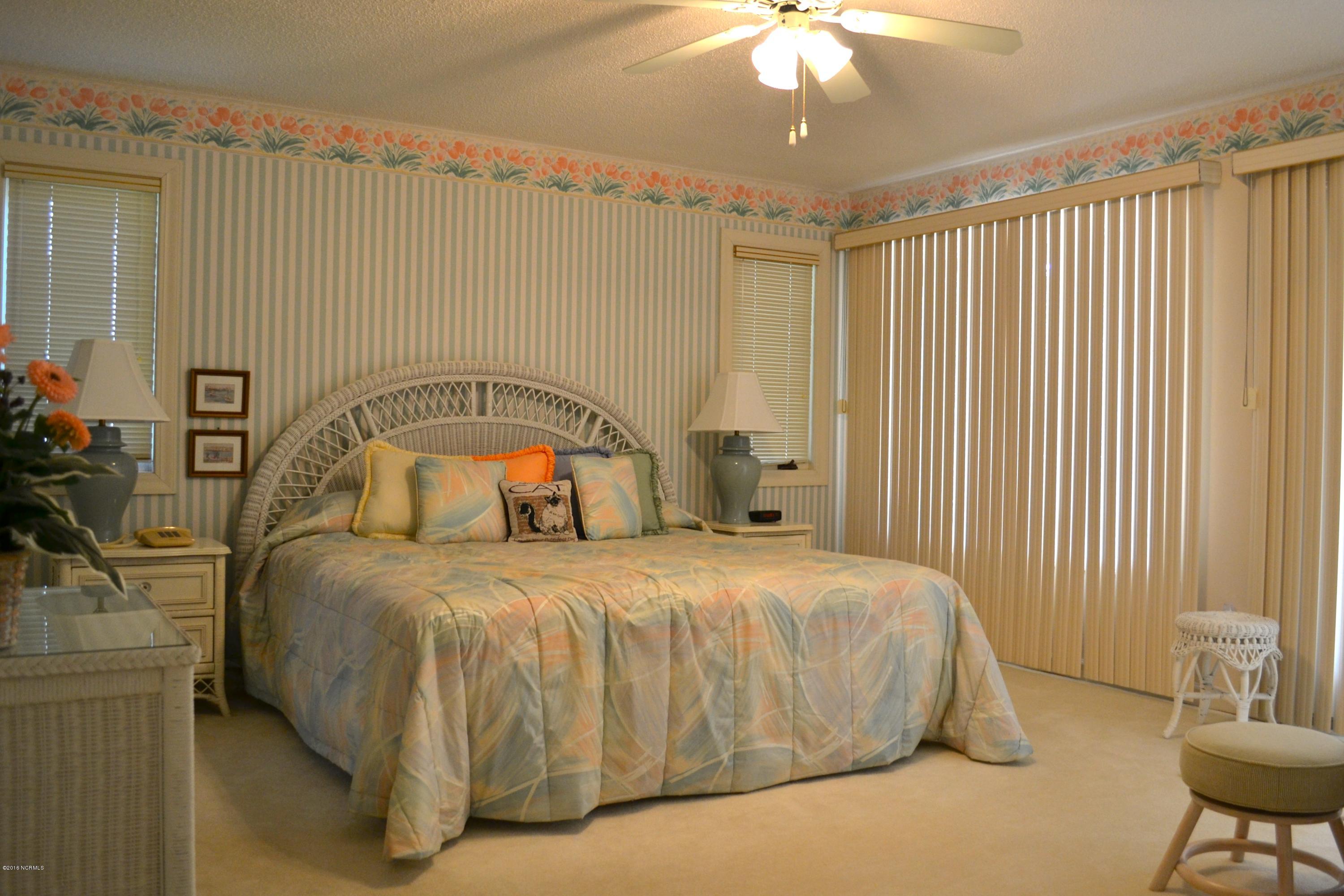 557 Coral Ridge Road Pine Knoll Shores, NC 28512 - Photo 9 of 31 Bedroom 1