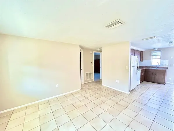 a view of a kitchen with kitchen