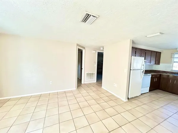 a view of a kitchen with a sink