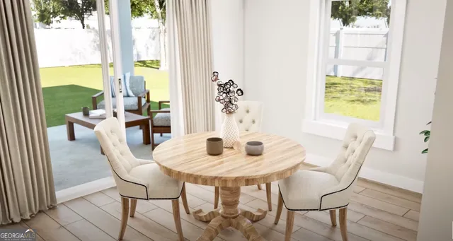 a dining room with furniture and window