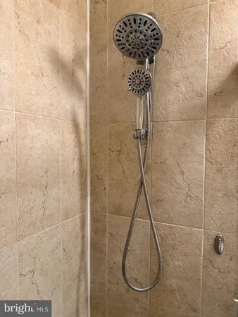 a bathroom with a granite countertop
