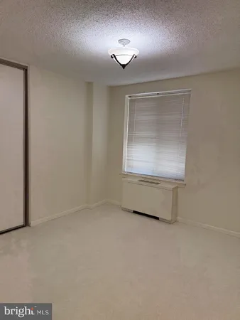 an empty room with an entryway
