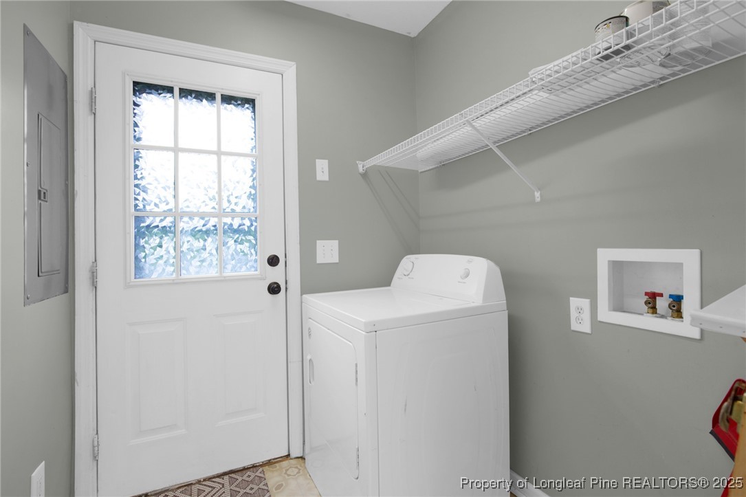 112 Madison Road Carthage, NC 28327 - Photo 14 of 27 a utility room with dryer and washer