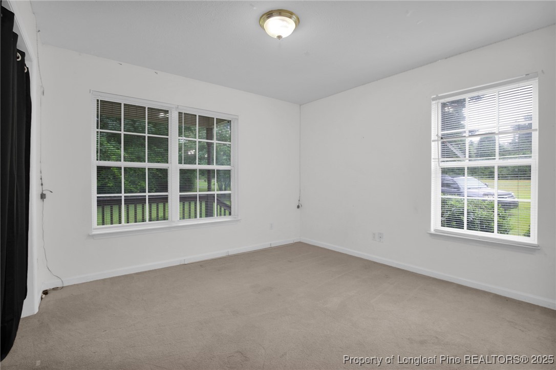 112 Madison Road Carthage, NC 28327 - Photo 15 of 27 an empty room with a window