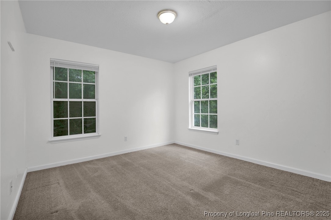 112 Madison Road Carthage, NC 28327 - Photo 19 of 27 an empty room with a window