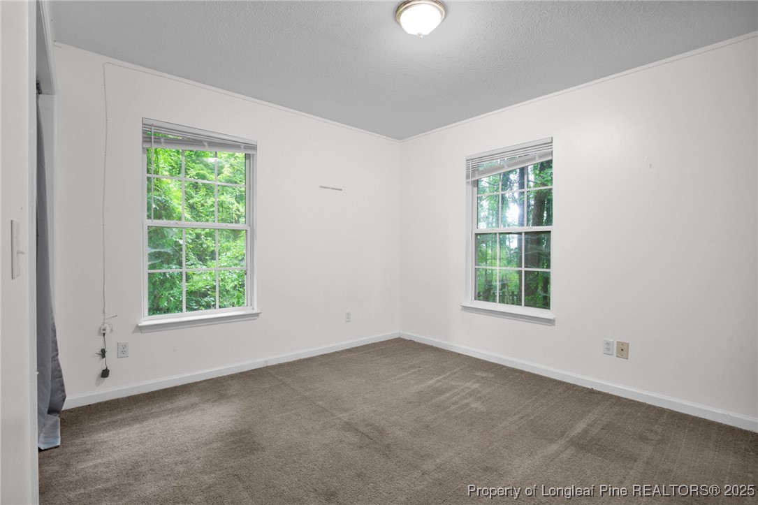 112 Madison Road Carthage, NC 28327 - Photo 21 of 27 an empty room with a window