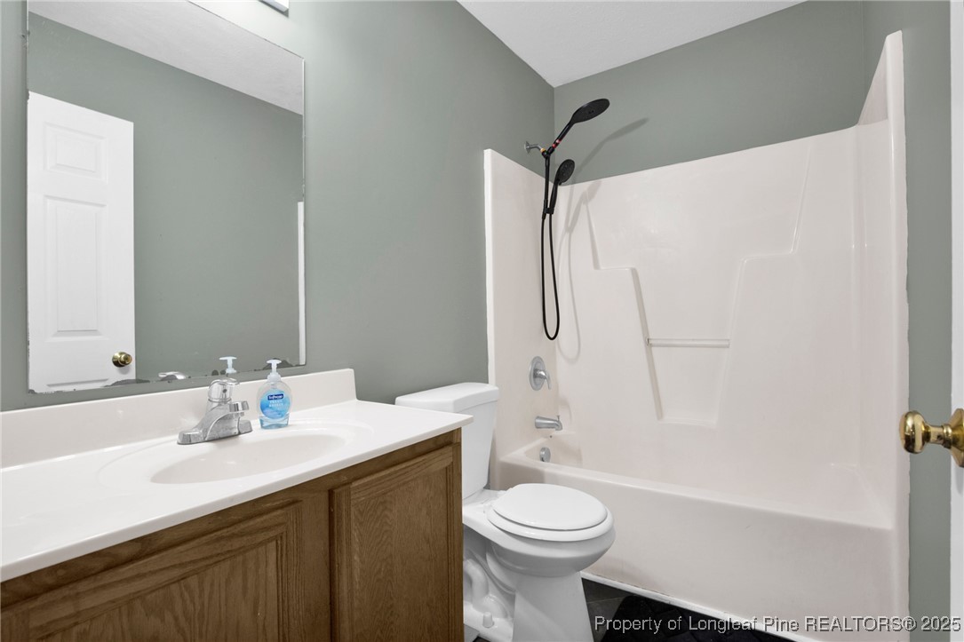 112 Madison Road Carthage, NC 28327 - Photo 23 of 27 a bathroom with a sink toilet and shower