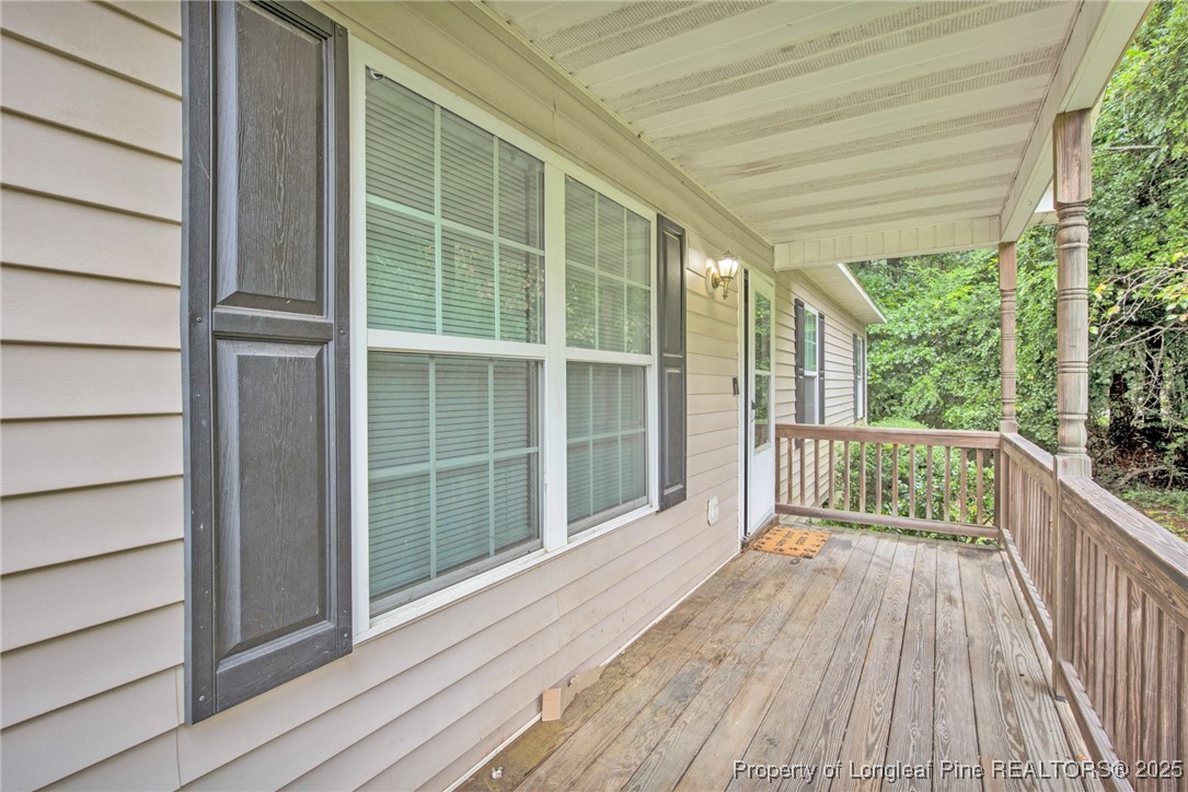 112 Madison Road Carthage, NC 28327 - Photo 4 of 27 a view of balcony with wooden floor